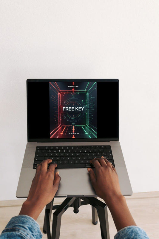 Person using a laptop with a 'FREE KEY' course on the screen