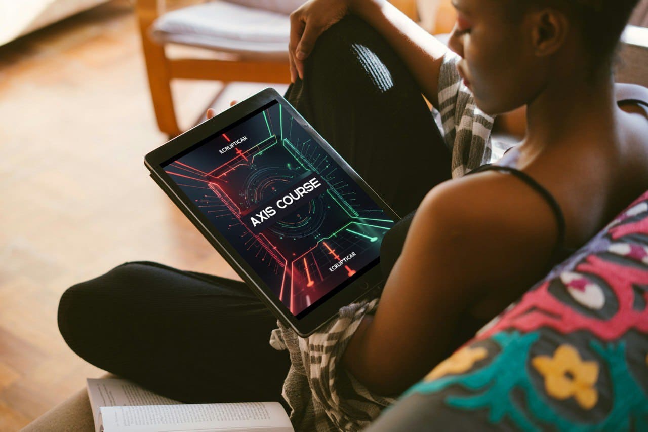 Person holding a tablet with a AI course 'Axis Course' interface on a wooden floor.